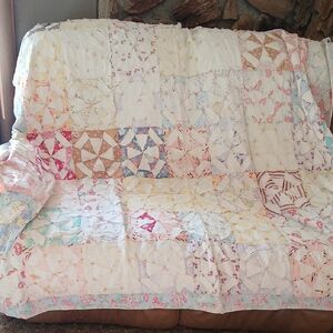 Antique Patchwork Quilt with Pastel Patterns